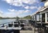 Sürther Bootshaus am Rhein und der Blick nach Bonn